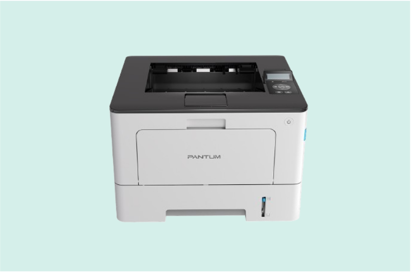 Impresora inkjet compacta de color blanco con cartuchos de tinta visibles, ideal para uso doméstico y pequeña oficina